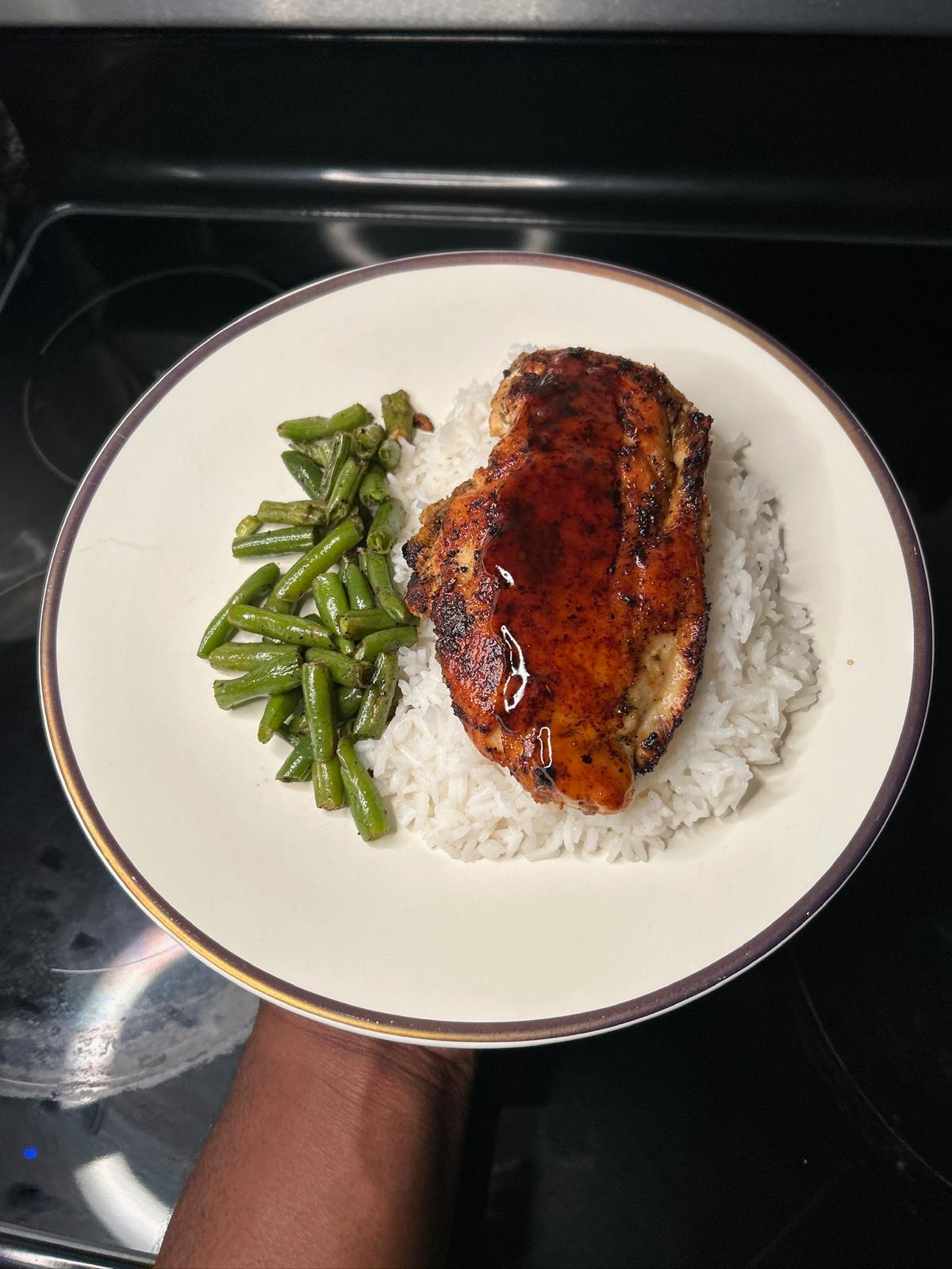 Salmon served with rice and green beans