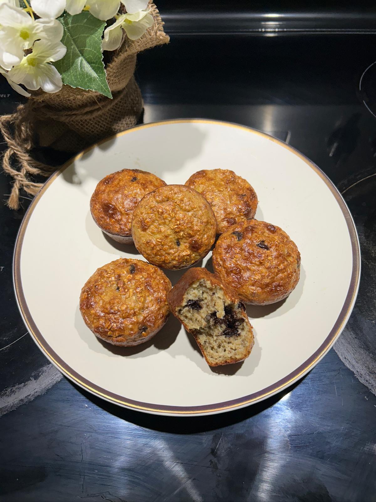 Freshly baked muffins on a cooling rack