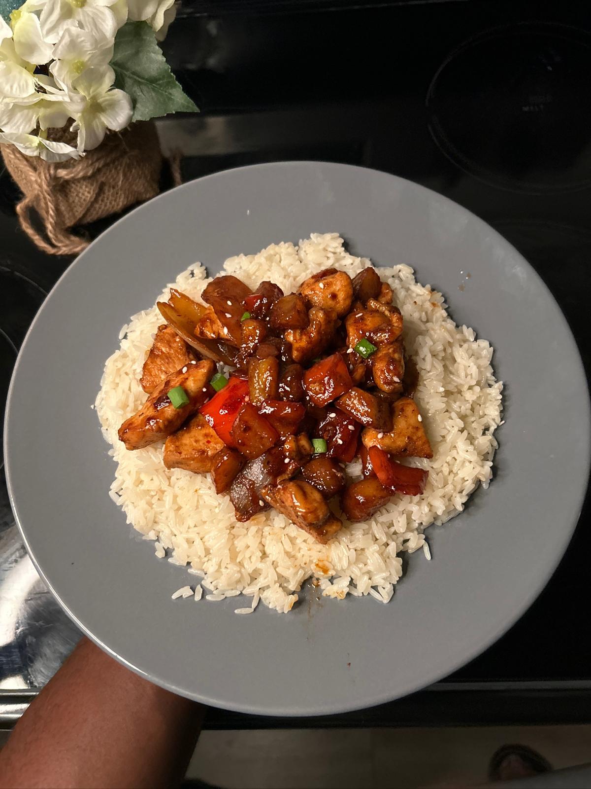 Glazed chicken served with rice