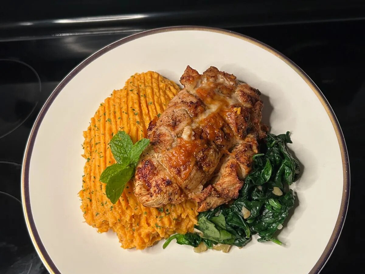 Grilled chicken with mashed sweet potato and sautéed greens